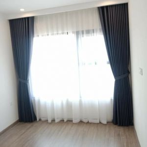 Rèm vải màu tối cản nắng tốt cho phòng ngủ chung cư